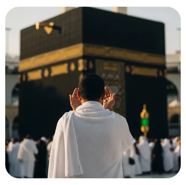 A pilgrim in prayer before the Kaaba, from the Marhaba website